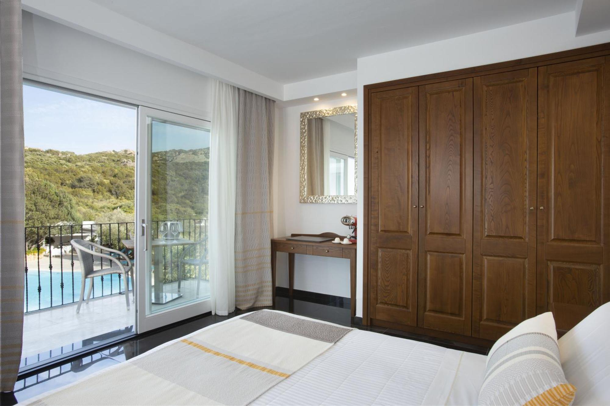 Hotel La Rocca Resort & Spa Baja Sardinia Extérieur photo